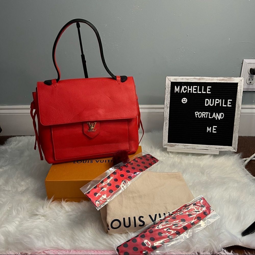 LOUIS vuitton calfskin lockme pm orient